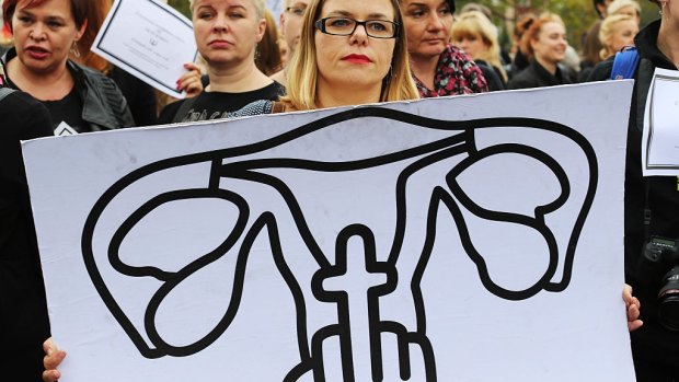 Thousands of women demonstrate in front of the Polish parliament against a legislative project that will effectively outlaw all abortions under every circumstance, including rape and incest. 