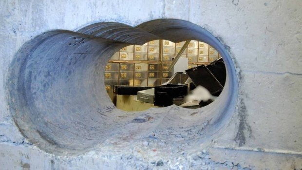 Thieves used a heavy duty drill to bore holes into the vault wall.