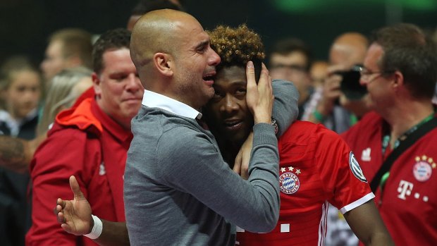 Tears of joy: Pep Guardiola celebrates his final game in charge of Bayern Munich with victory in the German Cup.