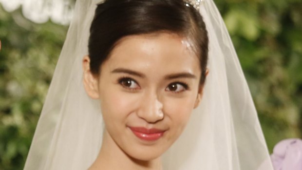Chinese actress Angelababy, pictured at her wedding earlier in October, endured some unusually invasive public scrutiny this week.  