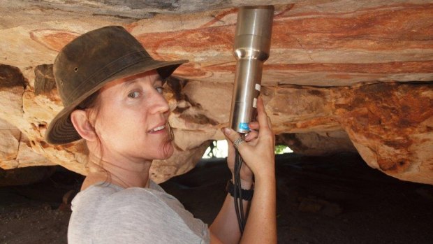 Dr Kira Westaway, a Macquarie University geochronologist, measures environmental radiation during the dating process. 