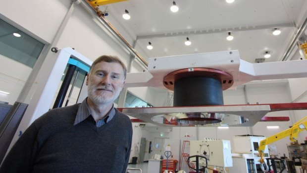 Professor Peter McGregor in the instrument assembly hall of the Advanced Instrumentation and Technology Centre at Mount Stromlo.