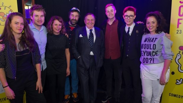 Barry Humphries (centre) with 2016 Barry Award nominees (from left to right) Zoe Coombs Marr, Damien Power, Anne Edmonds, David O'Doherty, Tom Ballard, Rhys Nicholson and Luisa Omielan.