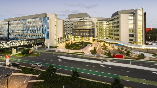 A woman is clinging to life in the Gold Coast University Hospital.