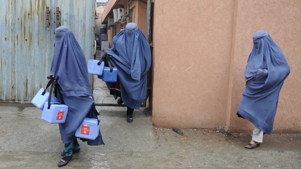 Female volunteer polio vaccinators in Afghanistan.