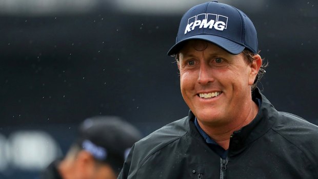 Luck of the draw: Phil Mickelson leads the British Open while the storms caused havoc for the chasing pack.