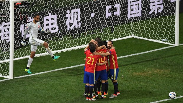 All for one: Spain scored another sublime team goal that included 21 passes against Turkey.