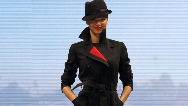 Miranda Kerr models the latest Qantas uniform.