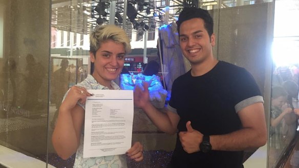 Mojgan Shamsalipoor and her husband Milad Jafari with Mojgan's bridging visa on December 21, 2016.