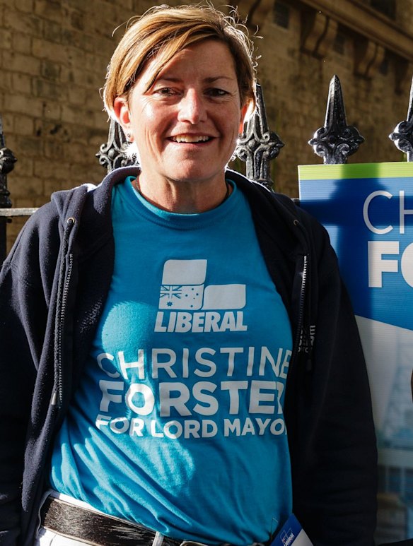Liberal candidate Christine Forster hands out how-to-vote cards in Surry Hills.