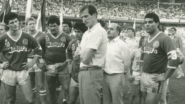 Mal Meninga, right, stands with Raiders coach Wayne Bennett following their defeat to Manly in the 1987 grand final.