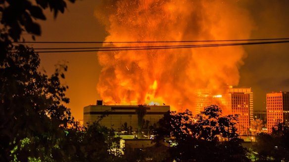 Massive fire closes freeways in downtown Los Angeles