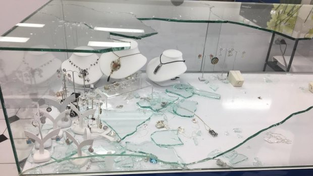 One of the smashed cabinets inside Jafari Jewellery on Thursday.
