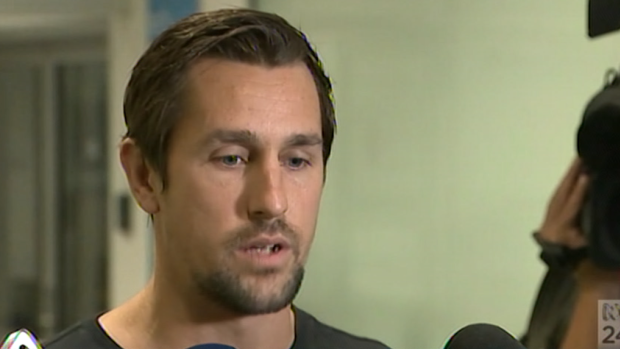 Mitchell Pearce address media on his arrival in Sydney from an overseas rehabilitation facility on Sunday morning.