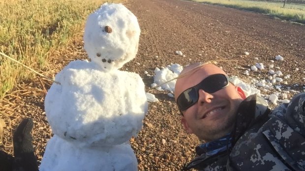 Kristjan Tommingas has some fun with the 'snow' on a Wickepin farm on Thursday.