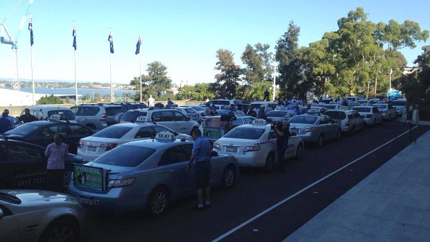 Taxis clog Parliament House in protest against the Uber service.