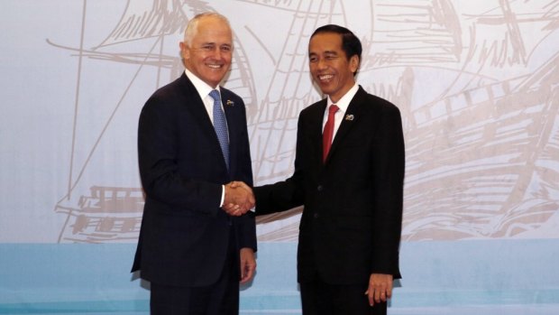 Indonesian President Joko Widodo, right, greets Australian Prime Minister Malcolm Turnbull. 