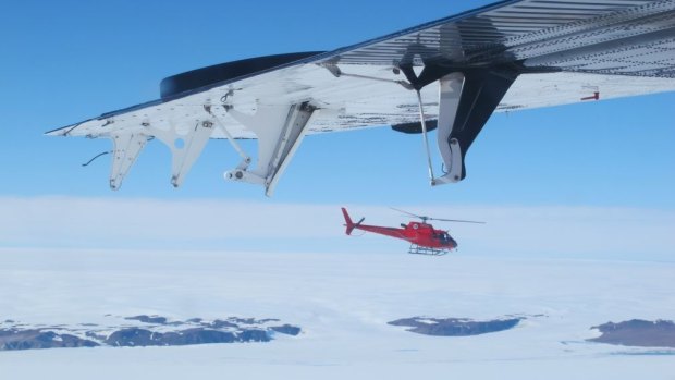 David Wood's flies one of the squirrel helicopters in Antarctica.