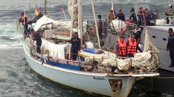 Philippine Navy personnel board the yacht "Rockall" after it was found abandoned in the Sulu Sea in southern Philippines over the weekend. 