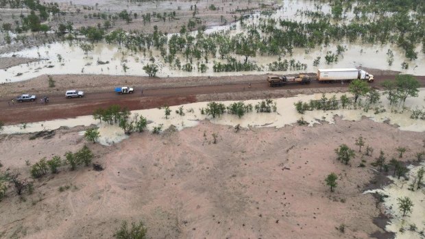 An aerial image shows stranded travellers in far north Queensland on Sunday, surrounded by flood waters.