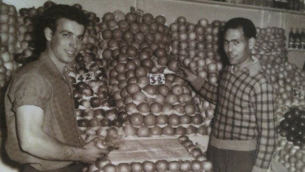 Gino Polimeni's father Luigi (left) and brother-in-law Charlie Cutri (right) in their Sydney fruit shop.
