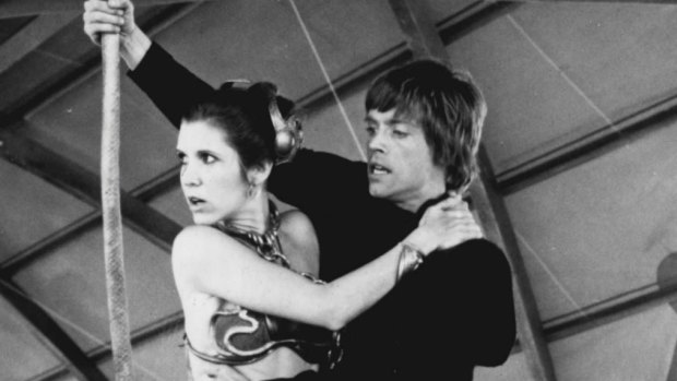 Luke (Mark Hamill) and Princess Leia (Carrie Fisher) prepare to swing to safety in the Return of the Jedi. Leia had limited lines in the early films.