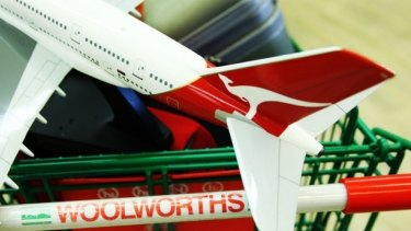 Woolworths is no longer expected to scrap Qantas frequent flyer points. 