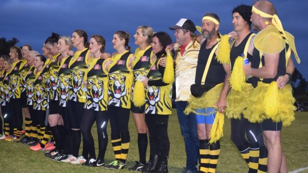 Some serious faces before bouncedown in the Dunsborough mum's footy match.