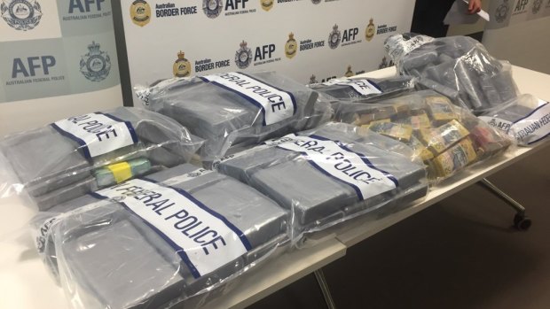 Cocaine and cash seized by police in a joint operation.
