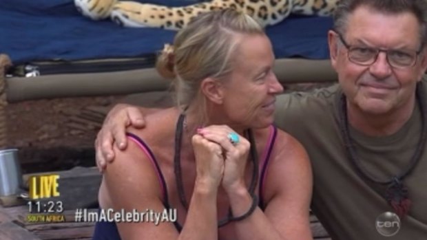 Steve Price comforts Lisa Curry when she was evicted; he was next to leave jungle.