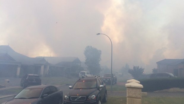 The smoke takes over Ellenbrook as the fire gets out of control