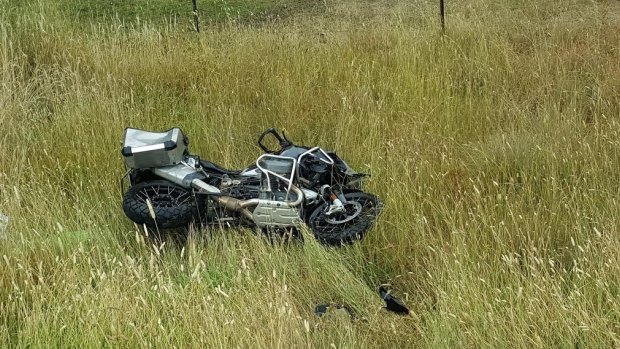 The damaged motorcycle beside the road after the accident that happened between Bombala and Cooma on Friday.