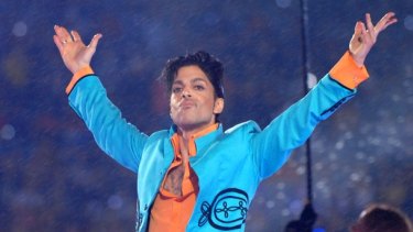 Prince appreciates the crowd during his 2007 Super Bowl half-time performance.