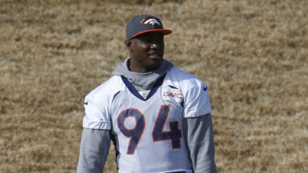 Not before time: Broncos linebacker DeMarcus Ware (left) has a chance to win his first Super Bowl.
