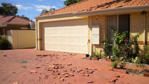 Tiles blew off Betty Foo's house after a low-flying passed her house in 2011.