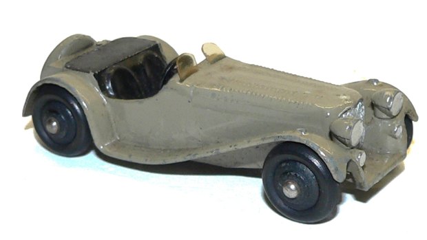 Dinky 38f Jaguar Sports Car, fawn with black interior. Passenger windscreen bent. Very good condition. Estimated price: $100-$300. Sold for $130.