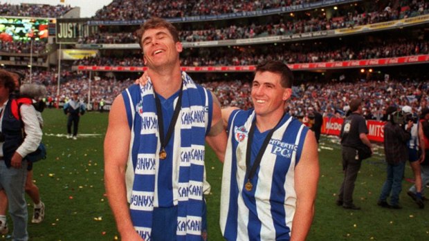 Wayne Carey and Anthony Stevens as teammates, after the 1996 Grand Final won by North Melbourne.