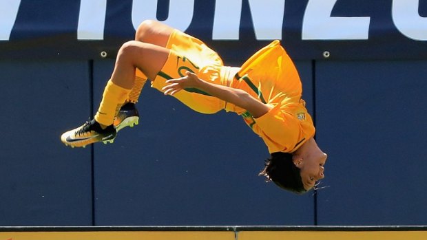 Sam Kerr performs her trademark backflip after  scoring a goal against Japan at the Tournament of Nations. 