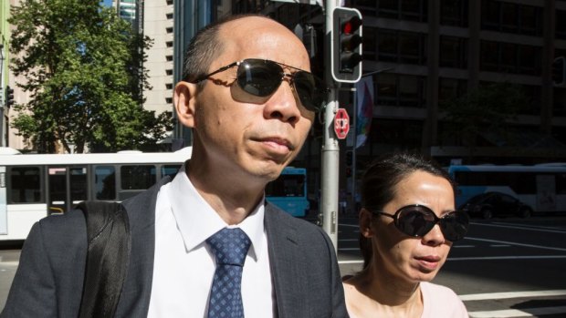 Robert Xie and his wife Kathy Lin arrive at the Supreme Court in December.