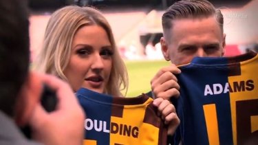 Ellie Goulding and Bryan Adams at a pre-game press conference.