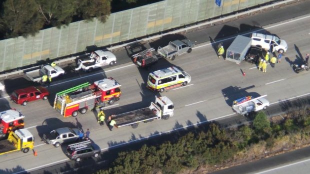 A crash blocks traffic in the northbound lanes of the M1 at Pimpama.