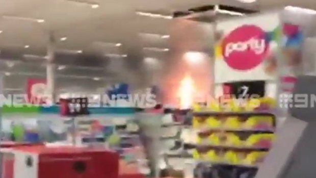 Flames could be seen in footage shot of the Kmart at the Logan shopping centre.