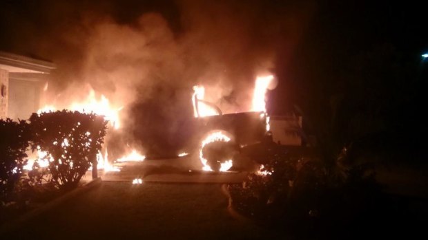 A burning vehicle at the centre of alleged arson attack related to an outlaw bikie gang.