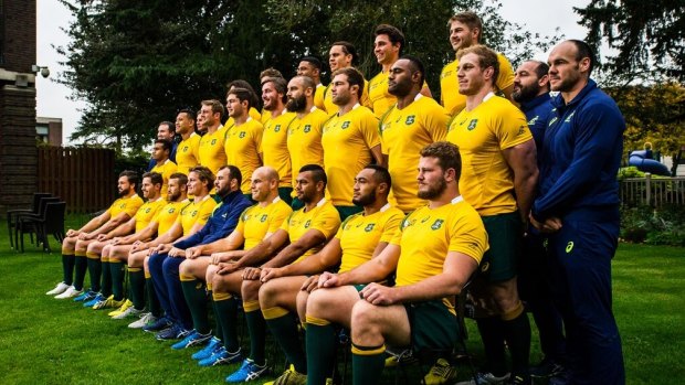 Together as one: The Wallabies pose for their team photo.