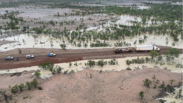 An aerial image shows stranded travellers in far north Queensland on Sunday, surrounded by flood waters.