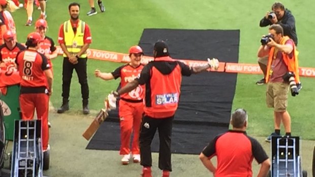 Chris Gayle is approached by Renegades WBBL player Jenny Taffs.