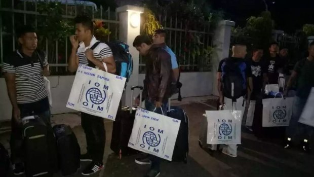 The second group of refugees to be accepted for resettlement in the US has left Port Moresby for the United States this morning. They are pictured here leaving the Port Moresby hotel early this morning.