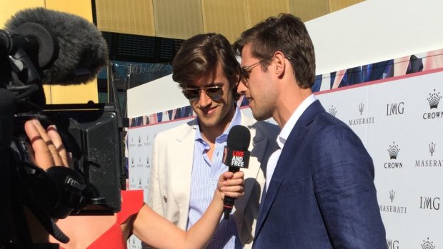 Models Zac and Jordan Stenmark at the IMG Tennis Party.