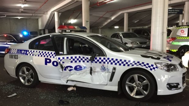 A police car was damaged in the incident.