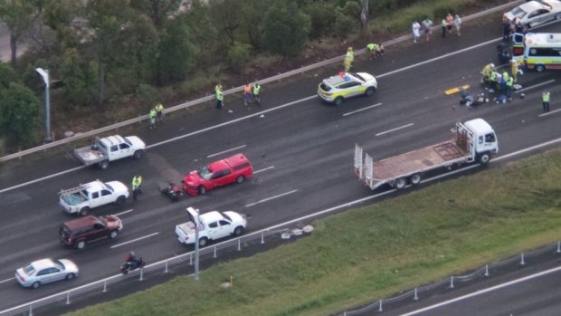 Emergency crews at the scene of a crash on the Bruce Highway at Murrumba Downs.